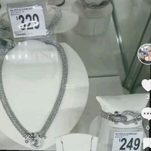 A beautiful silver and diamond necklace and matching bracelet set. Gently worn.